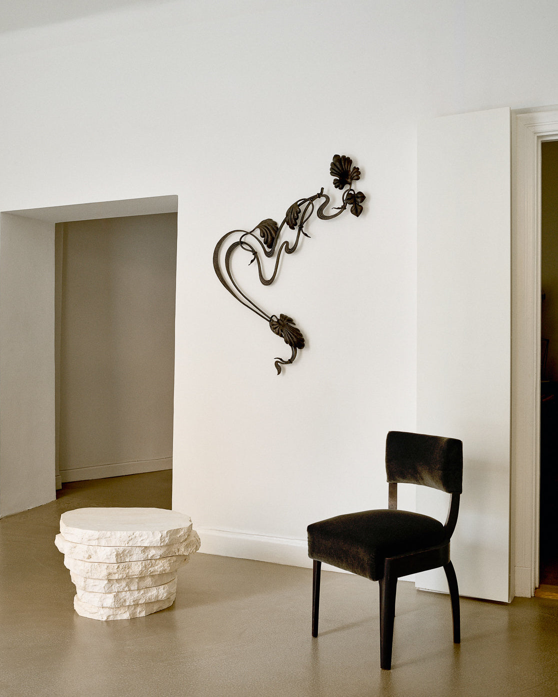 Table, 2025, Jesper Sundberg Örtegren, installed in gallery with wall-mounted sculpture, context view