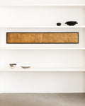 Antique Japanese two-panel gold leaf screen displayed horizontally on white shelving with decorative bowls.