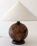  French Art Deco carved walnut table lamp c.1925, spherical base with rose motif and hemp shade, full view unlit