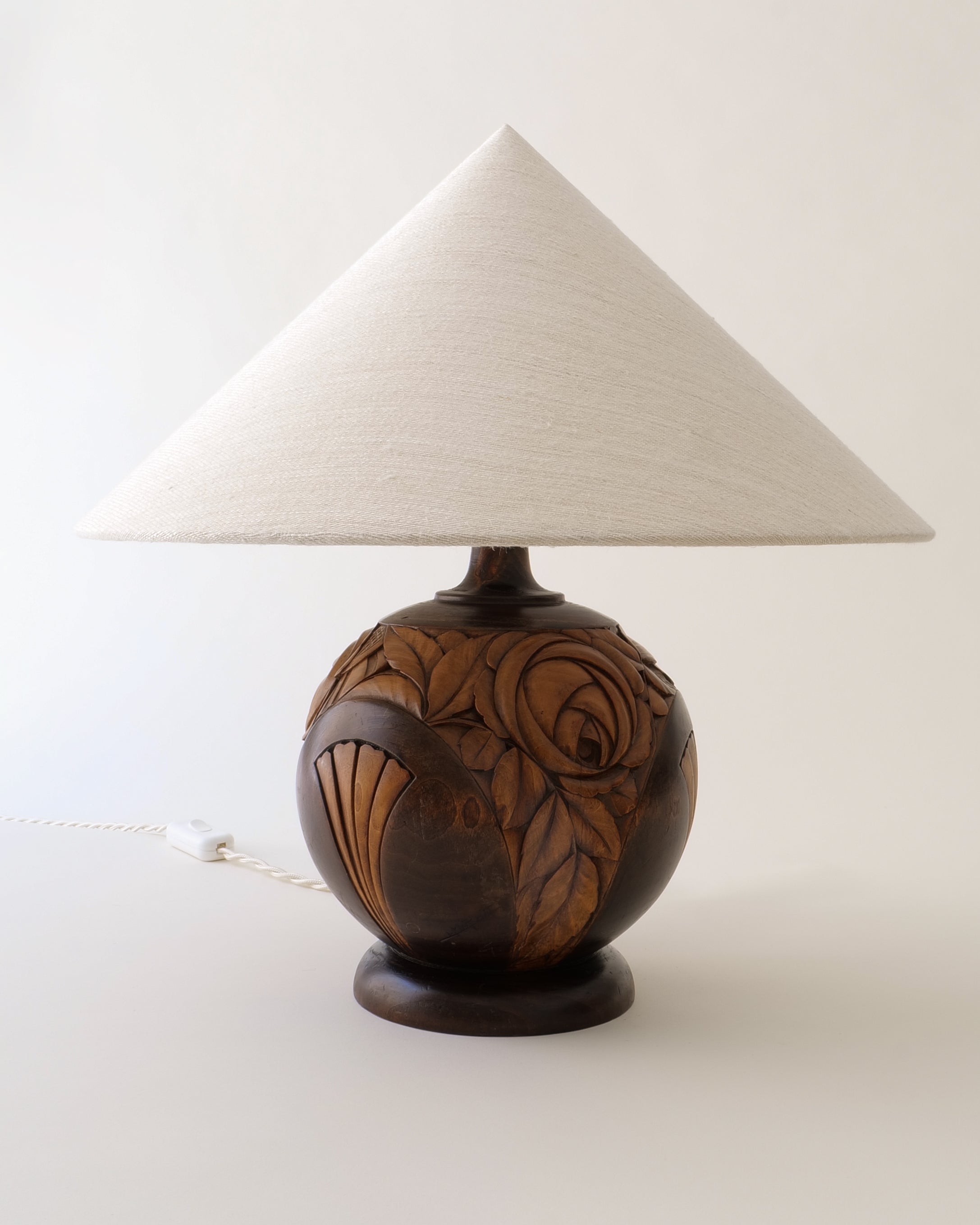 French Art Deco carved walnut table lamp, full view with hemp shade, tighter crop