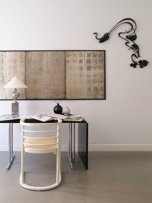 Art Nouveau wrought iron dekorelement styled in modern interior as decorative wall art