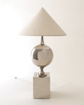 Philippe Barbier chrome table lamp 1970s, chrome sphere on travertine base with conical shade, full view unlit
