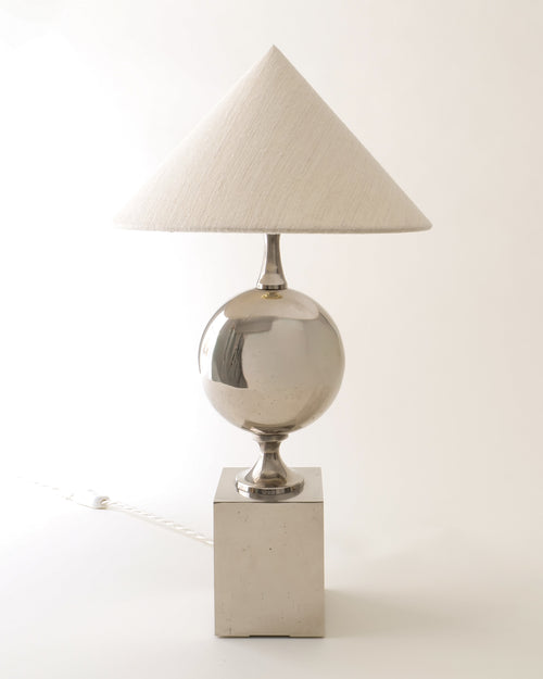 Philippe Barbier chrome table lamp 1970s, chrome sphere on travertine base with conical shade, full view unlit