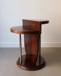 A two-tiered occasional table with a walnut veneer finish and chrome pillars, attributed to Jules Leleu.