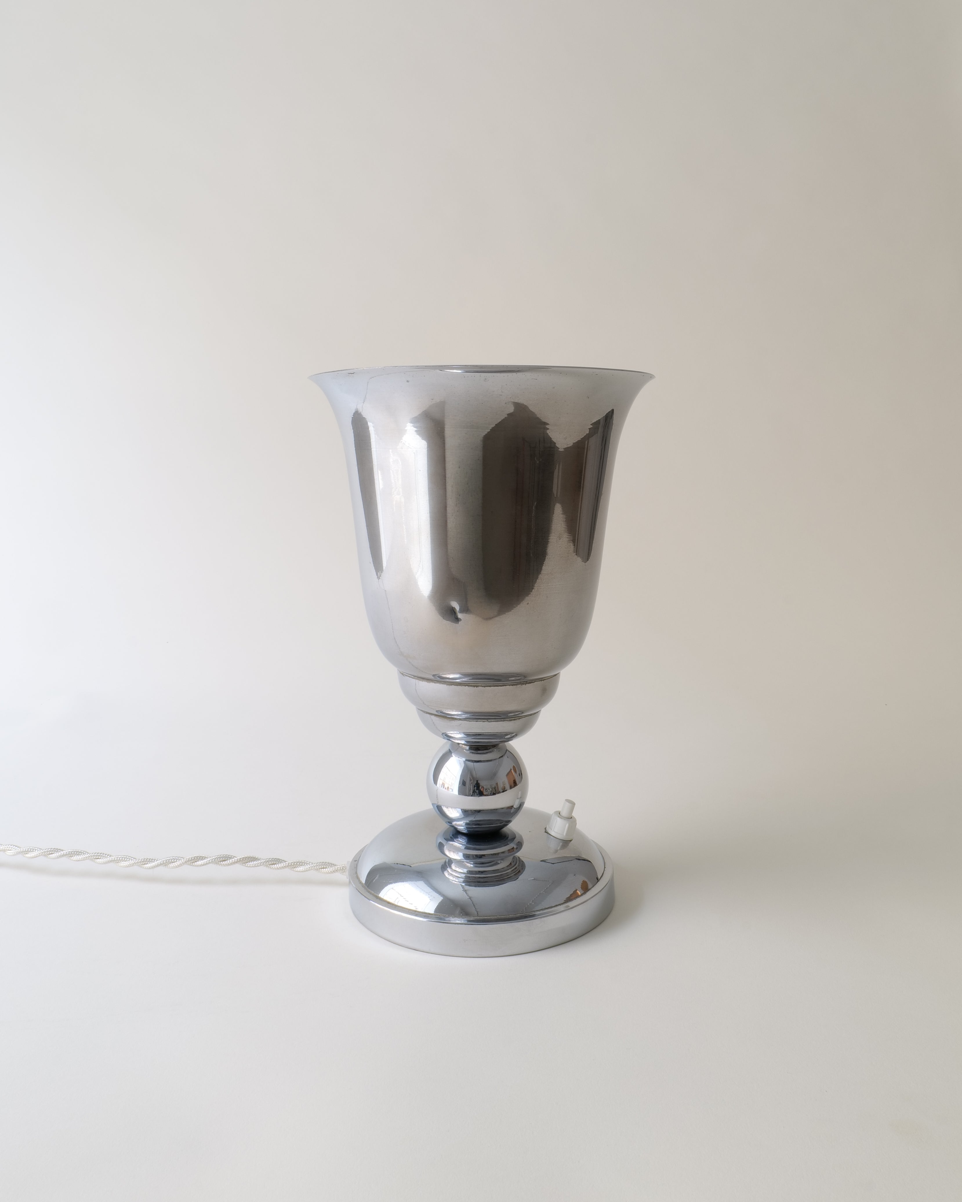 French Art Deco chrome uplighter table lamp, c.1930, full view with shade dent detail