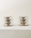 Gio Ponti silver-plated cups and saucers for Arthur Krupp Milano 1950s, two stacked sets of three, close-up