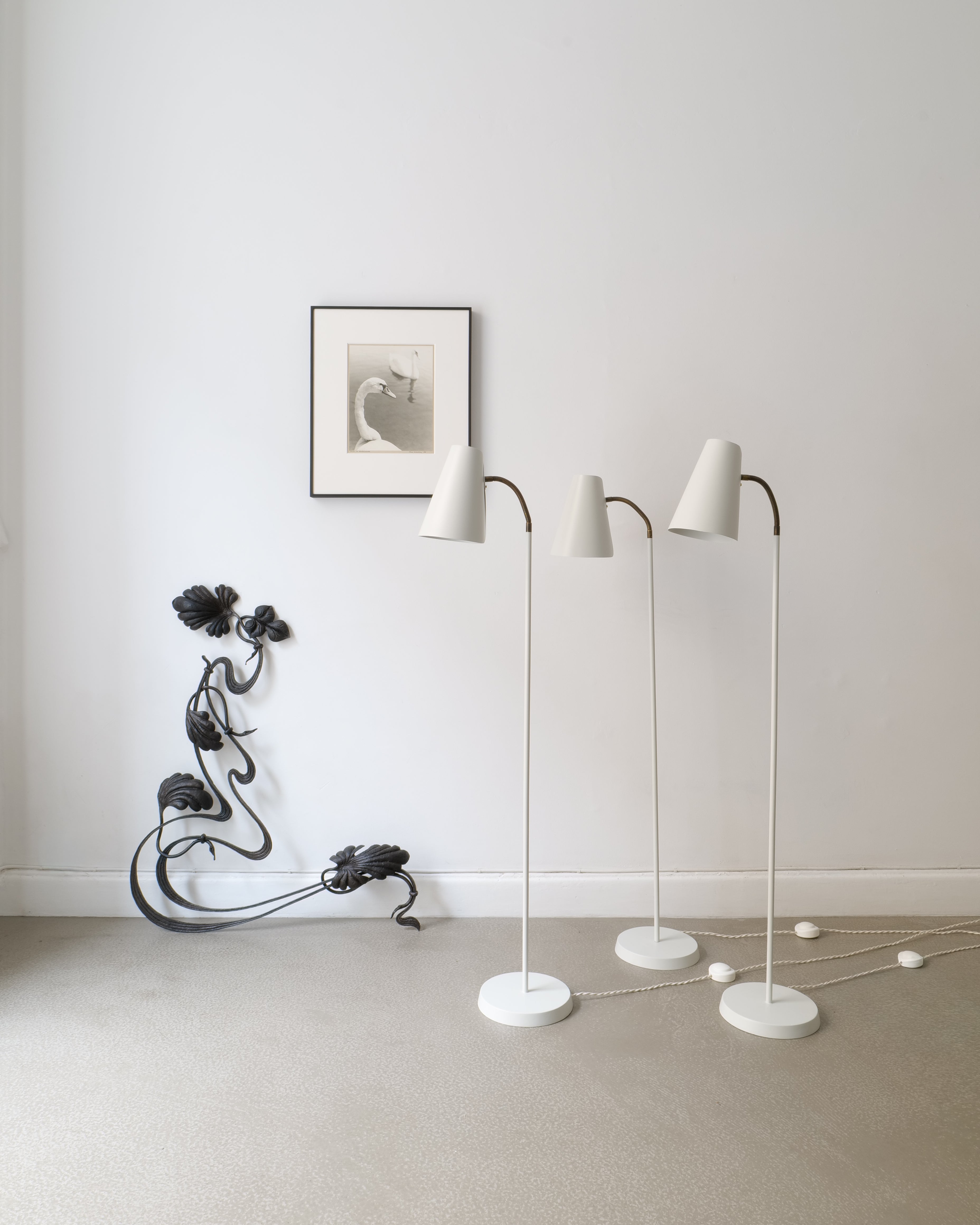 Harald Notini Model 225 floor lamp styled in interior setting