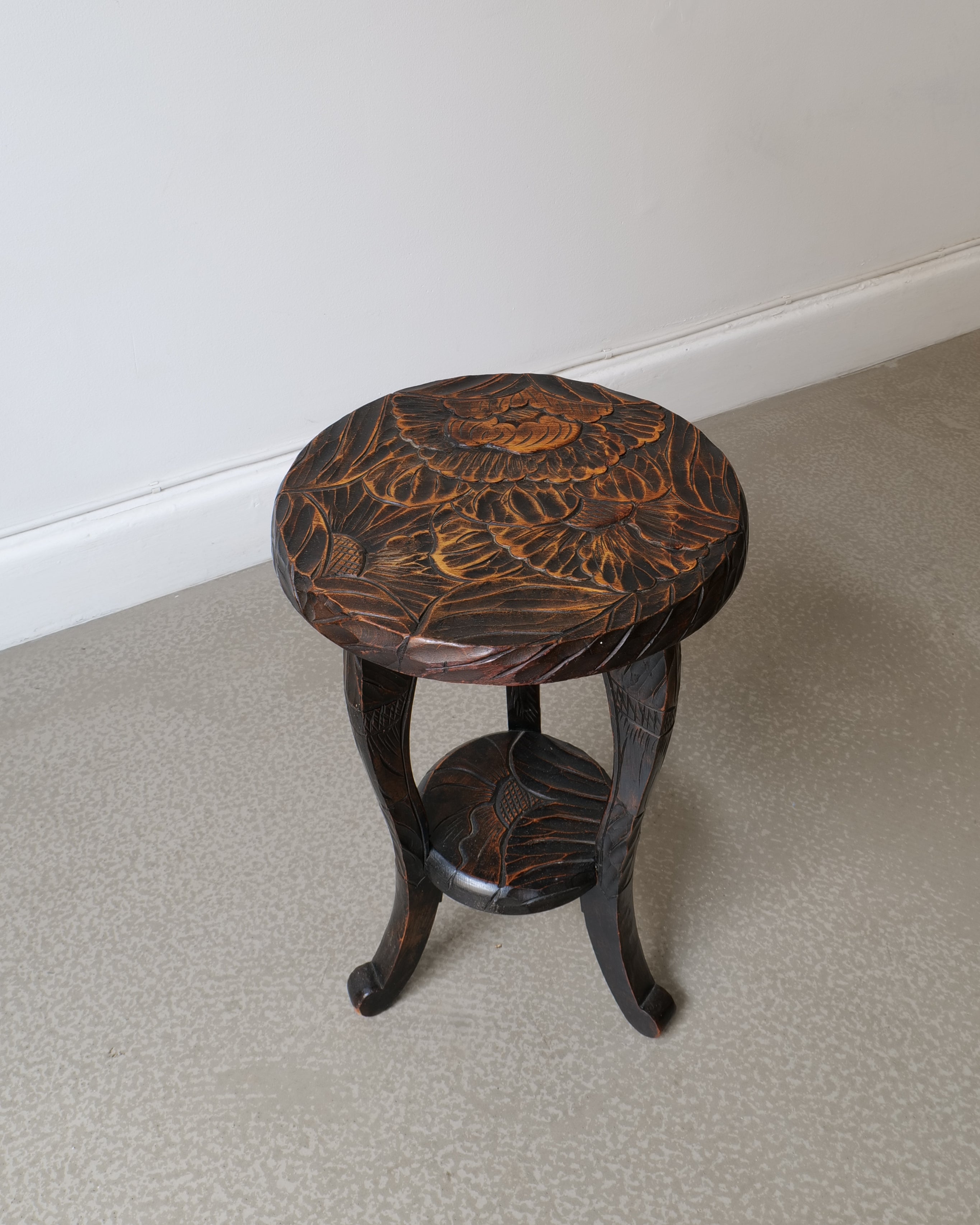 Top view of Liberty & Co Japanese side table showing circular carved peony surface, Ø28cm