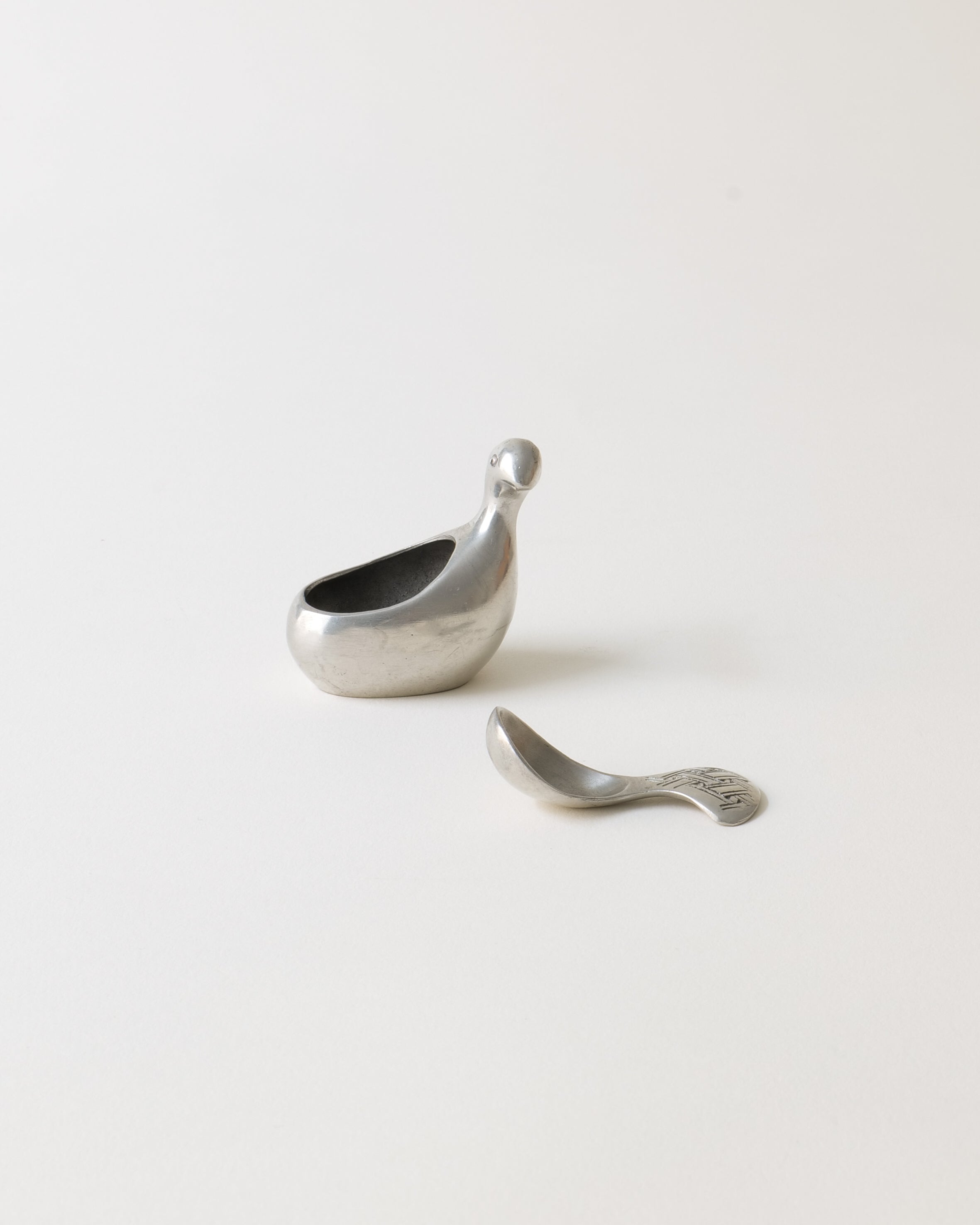 Lars Pirak Saltripa salt cellar, top view showing salt bowl and spoon rest tail