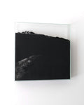 Mountain 03, 2026, Jesper Sundberg Örtegren, glass and carbon, angled wall-mounted view with shadow
