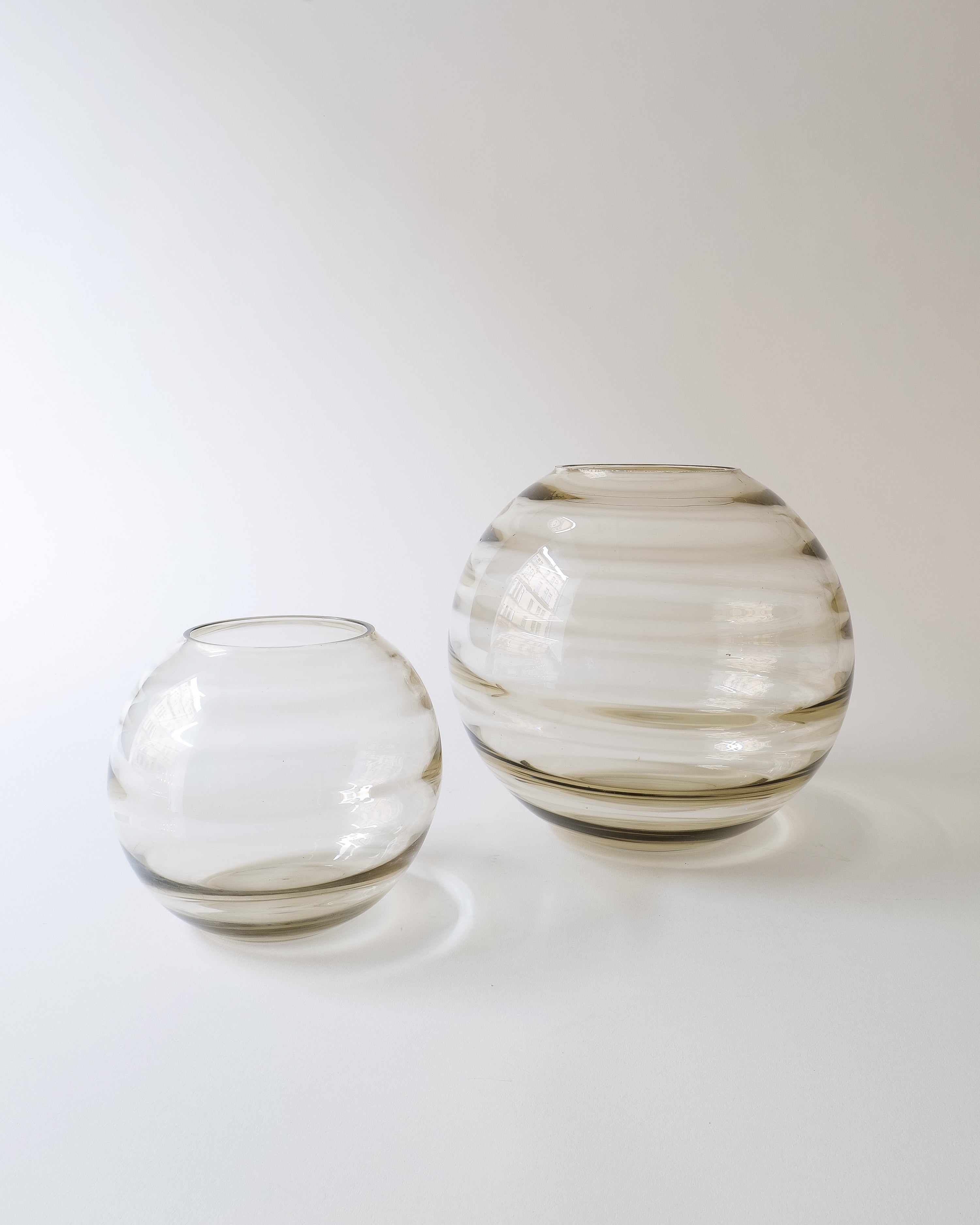 Two glass vases on a white background