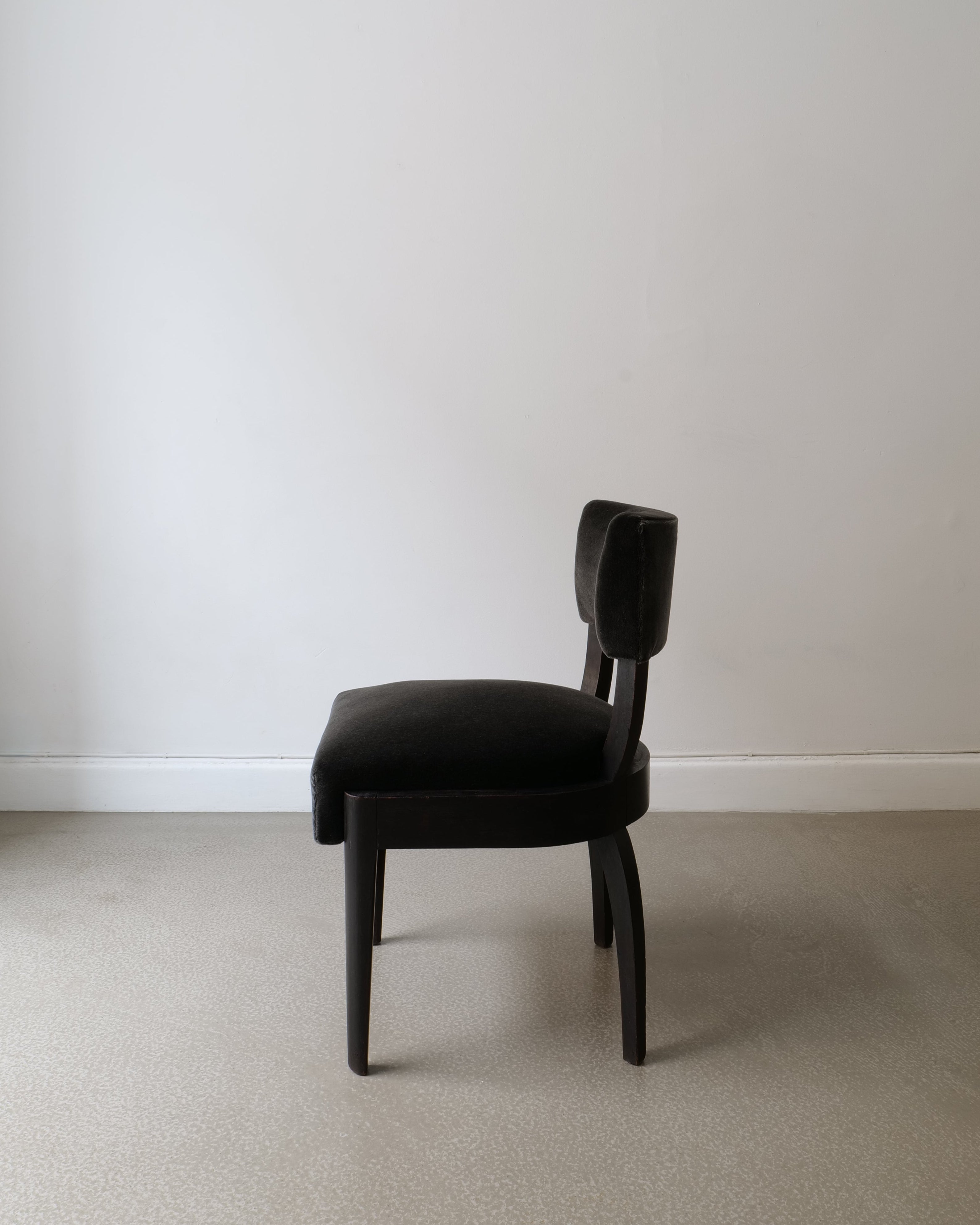  Side profile of René Prou Art Deco chair showing clean tapering legs and compact form