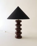 Doulton stacked sphere ceramic table lamp 1970s, bitter chocolate glaze with black conical shade, full view unlit