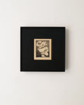 Framed artwork with a black border on a white background
