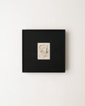 Surrealist engraving painting in black frame on white background.