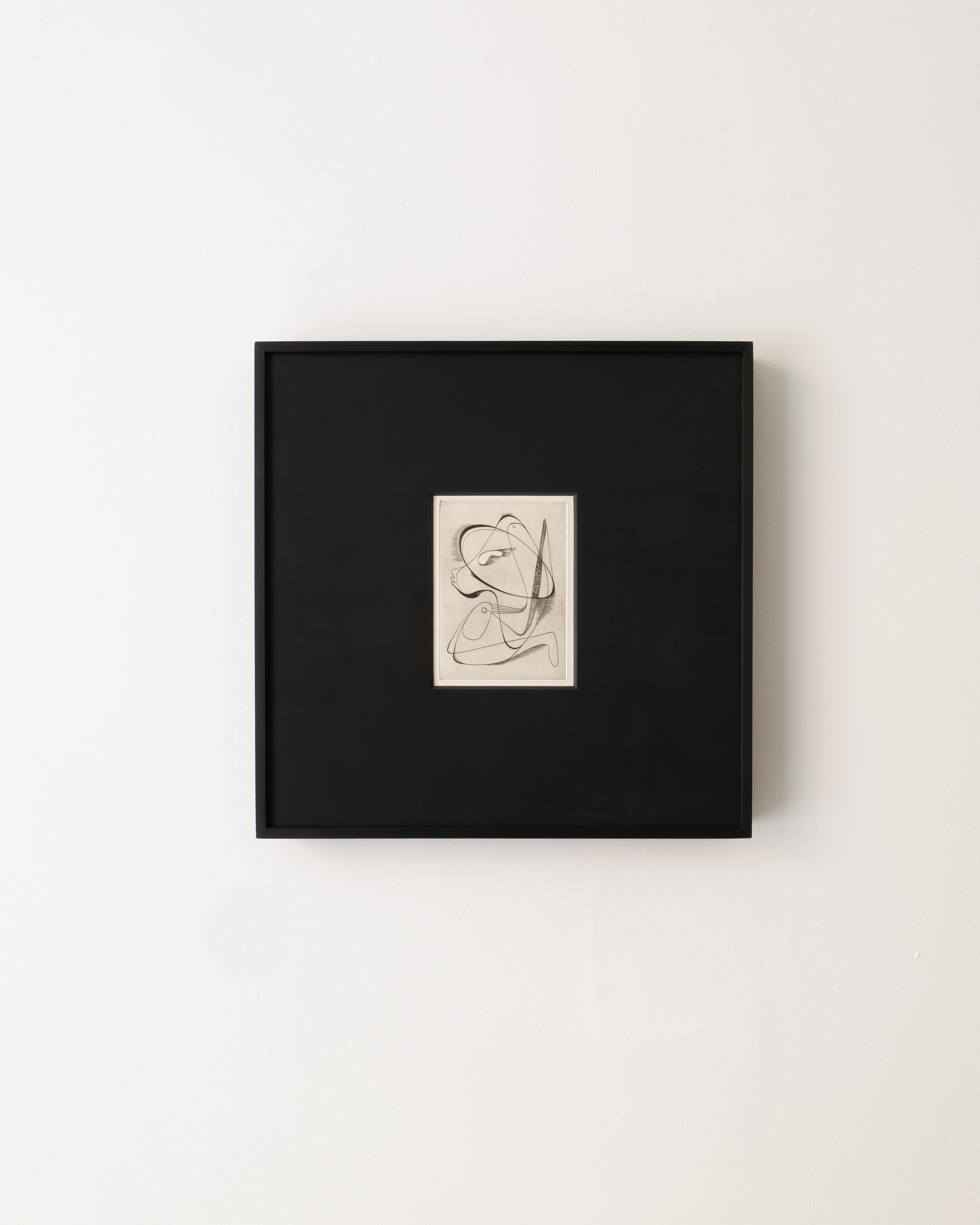 Surrealist engraving painting in black frame on white background.