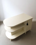 Swedish Art Deco lacquered desk 1930s, cream high-gloss, tiered wrap-around shelves and cabinet doors, full view